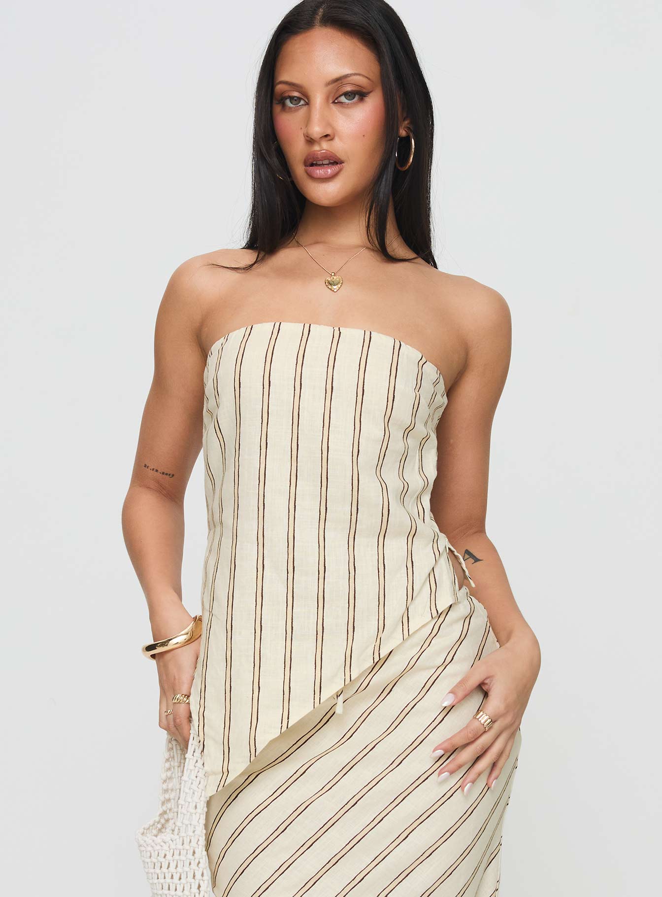 front view of model wearing Princess Polly Birdie Asymmetric Linen Blend Top Cream Sleeveless straight 