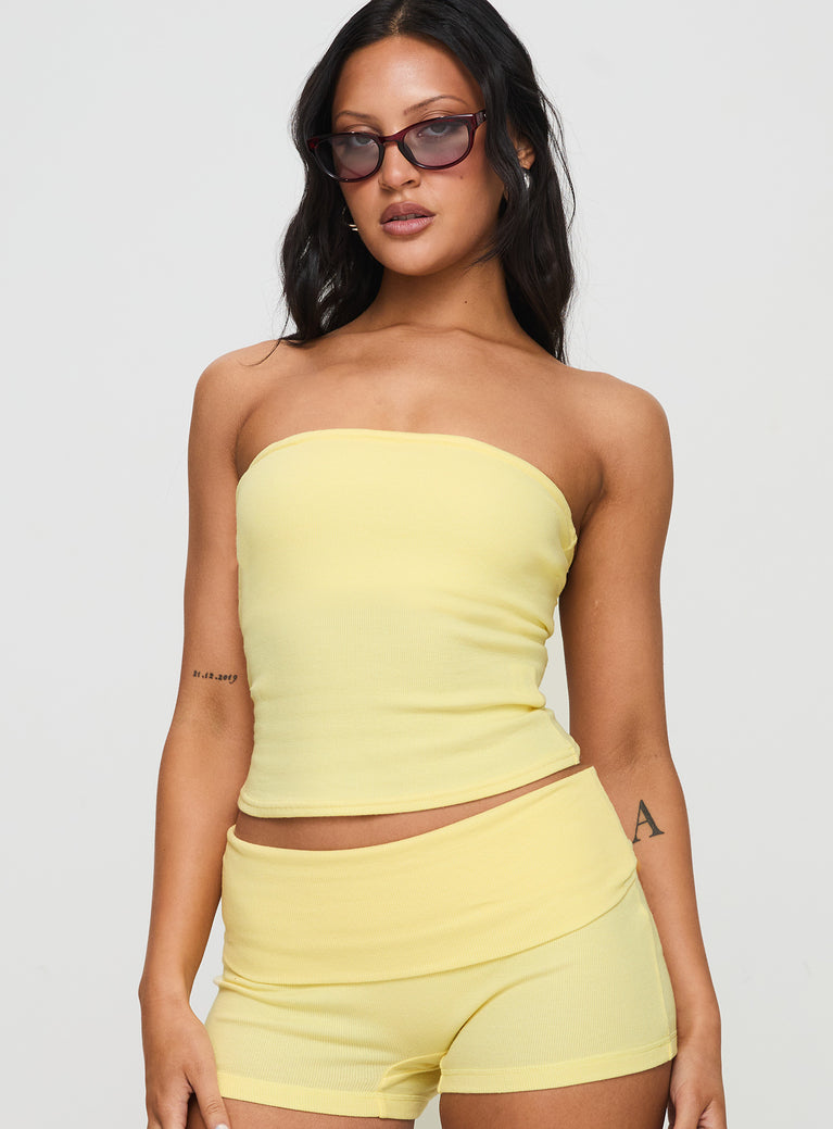 front view of model wearing Princess Polly Baseline Strapless Rib Top Yellow Sleeveless straight 