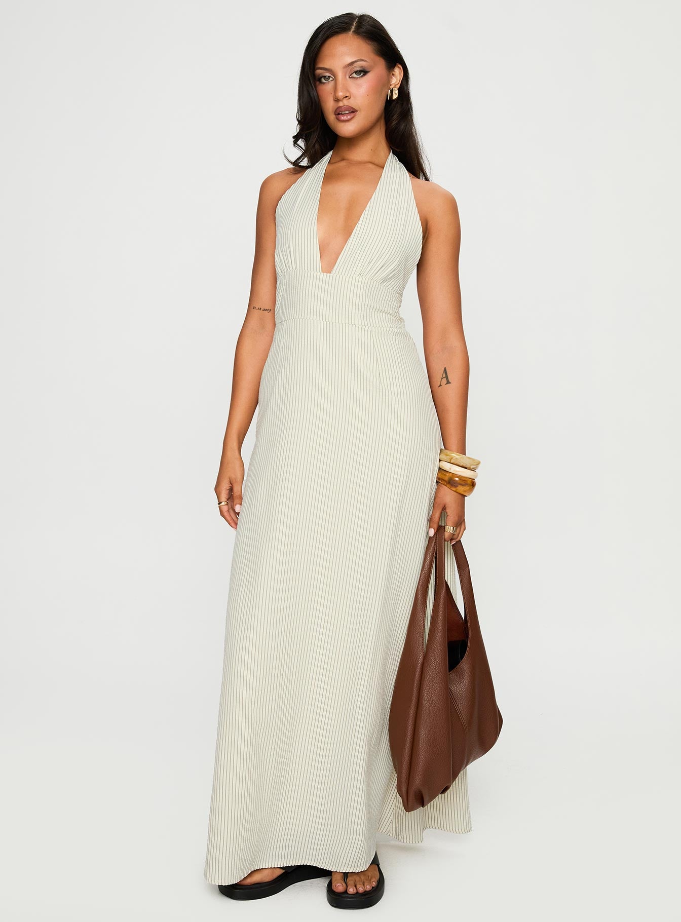 front view of model wearing Princess Polly Caralyn Halter Maxi Dress Multi Stripe Plunger 