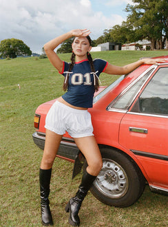 front view of model wearing Princess Polly Picu Shorts Poplin White Low Rise Shorts 