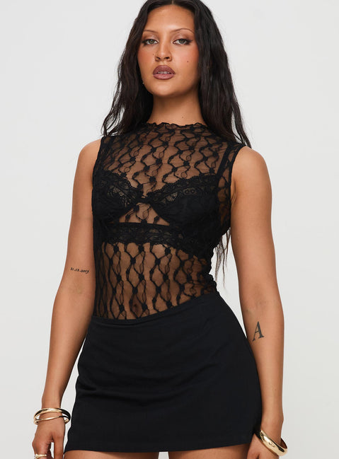 side view of model wearing Princess Polly Liedman Bodysuit Black Sleeveless Crew Neck 