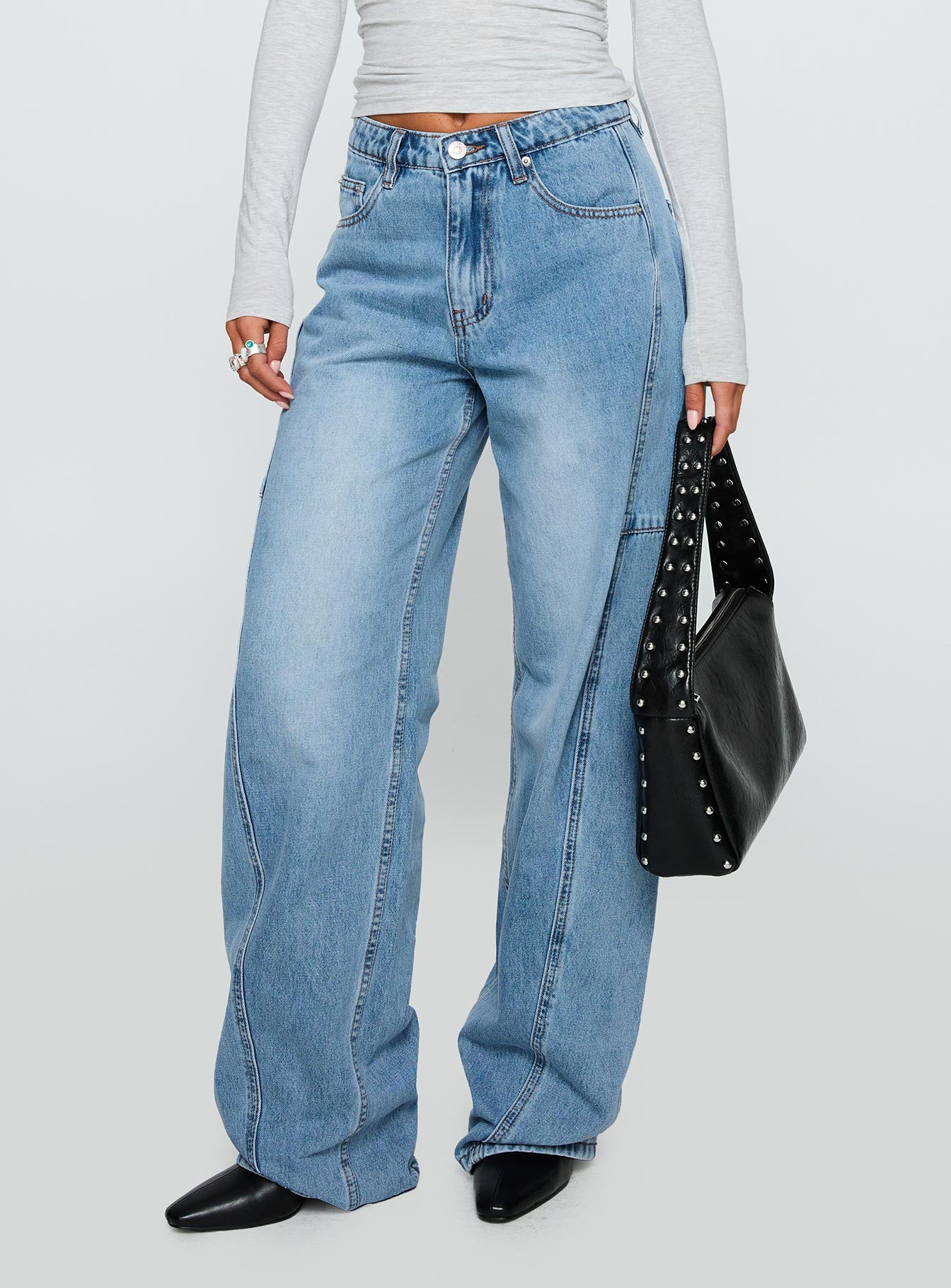 side view of model wearing Princess Polly Esperance Barrel Leg Jeans Vintage Blue High Waisted 