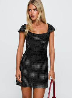 front view of model wearing Princess Polly Lucienna Polka Dot Mini Dress Black / White Square Neck 