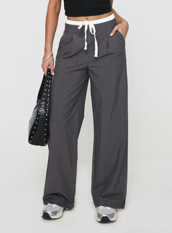 side view of model wearing Princess Polly Auclaire Pinstripe Pant Charcoal High Waisted Pants 