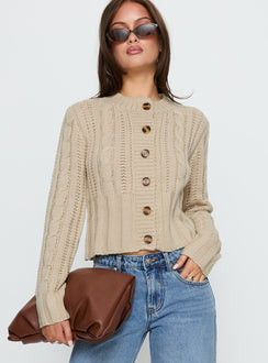 front view of model wearing Princess Polly Donielle Cable Knit Cardigan Beige cropped 