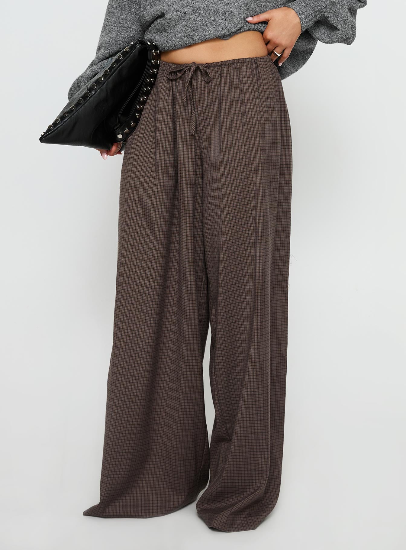 side view of model wearing Princess Polly Bungala Oversized Relaxed Pant Brown Check Mid Rise Pants 