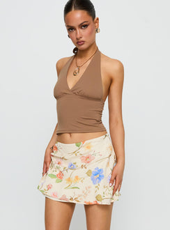   side view of model wearing Princess Polly Feed The Soul Mini Skirt Floral Multi Mini Skirts 