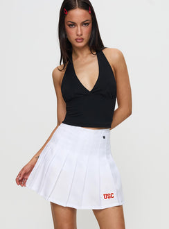   front view of model wearing Princess Polly USC Tennis Skort White 