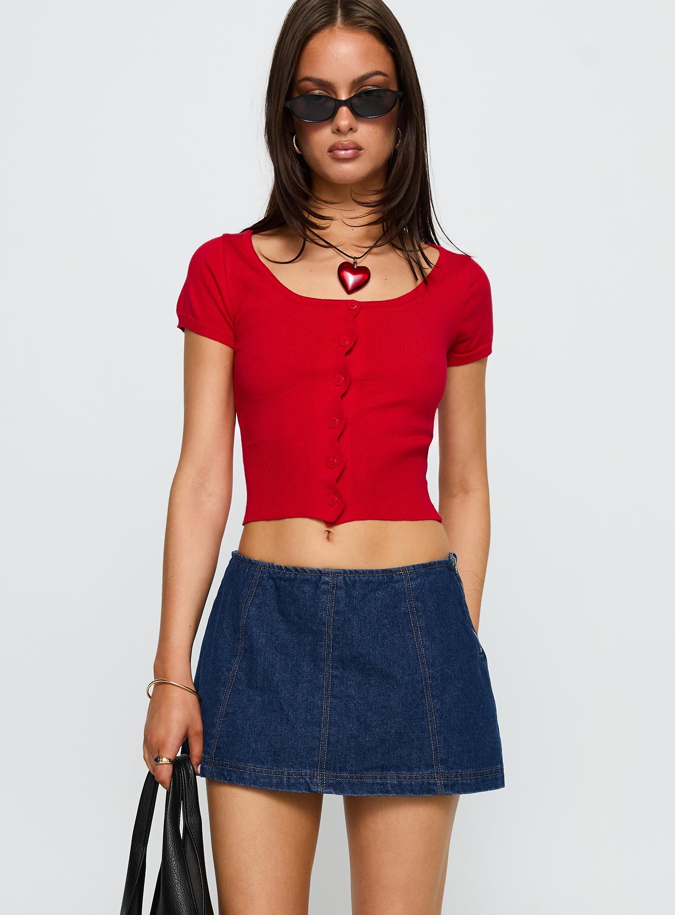 side view of model wearing Princess Polly Lemoni Skort Denim Blue Low Rise Shorts 