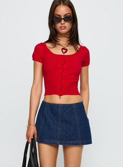 side view of model wearing Princess Polly Lemoni Skort Denim Blue Low Rise Shorts 