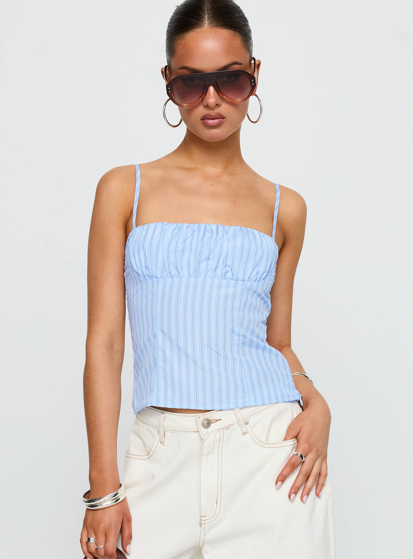 front view of model wearing Princess Polly Isolabella Top Blue Stripe Sleeveless Square Neck 