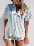 front view of model wearing Princess Polly Goody Linen Button Front Top Blue Stripe Short Sleeves V-Neck 