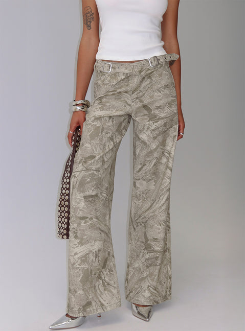side view of model wearing Princess Polly Mckinley Mid Rise Wide Leg Jeans Camouflage Mid Rise Jeans 