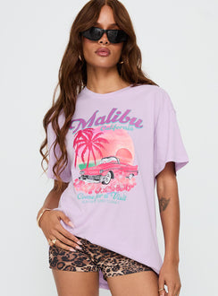 front view of model wearing Princess Polly Malibu Sunset Oversized Graphic Tee Purple Half Sleeves Crew Neck 