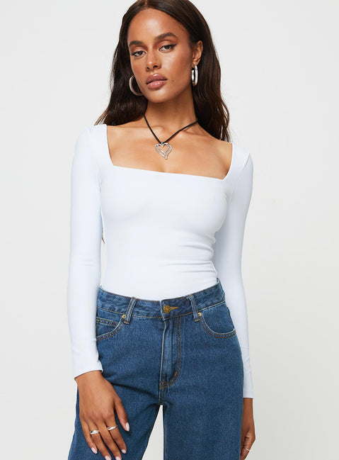 front view of model wearing Princess Polly Mera Long Sleeve Bodysuit White Full Sleeves 