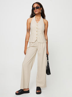 Matching linen set Halter neck top, fixed halter strap, button fastening at front, twin hip pockets High rise pants, belt looped waist, zip and button fastening, elasticated waistband at back, twin hip pockets, straight leg