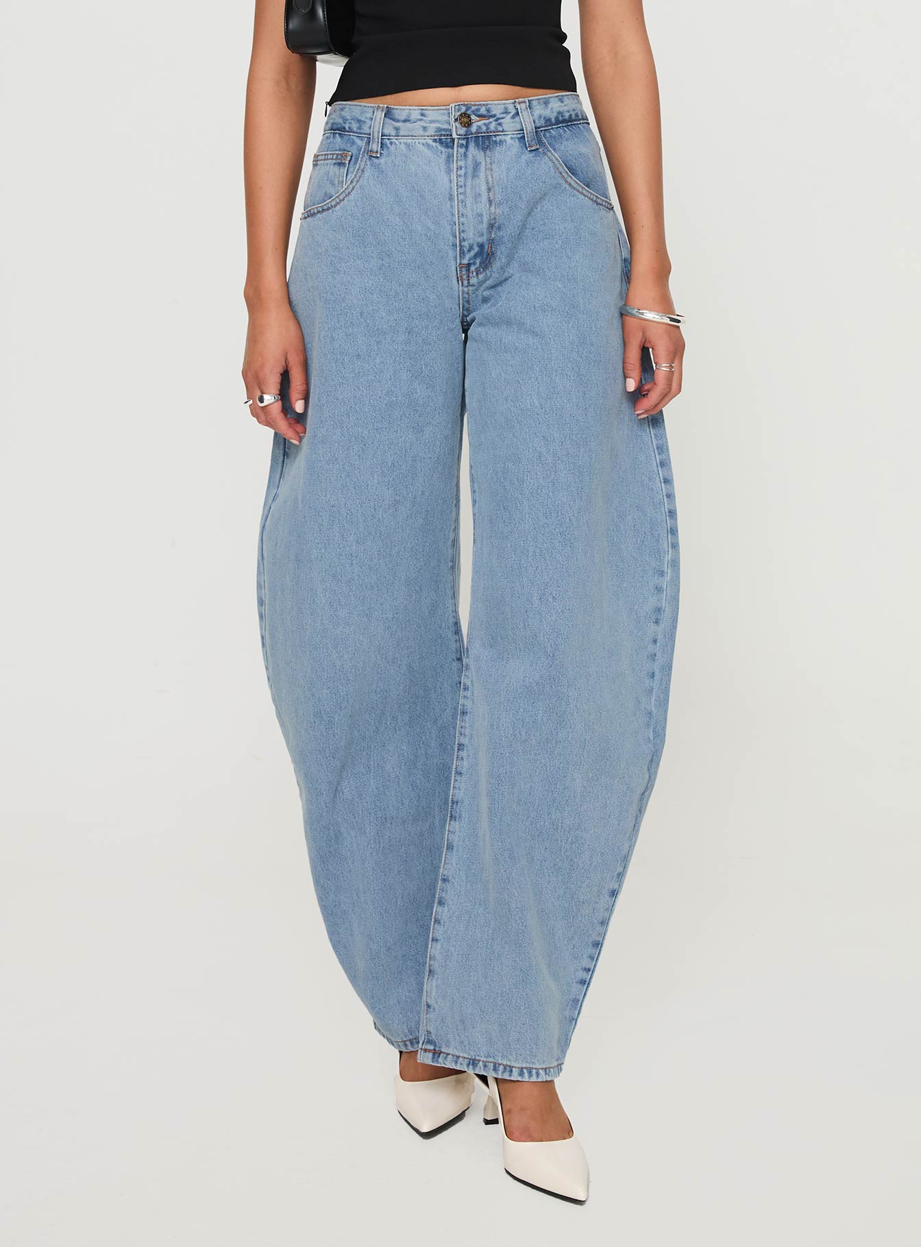 back view of model wearing Princess Polly Horseshoe Jeans Washed Blue High Waisted 