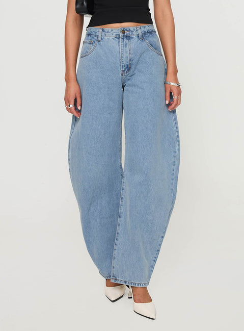 back view of model wearing Princess Polly Horseshoe Jeans Washed Blue High Waisted 