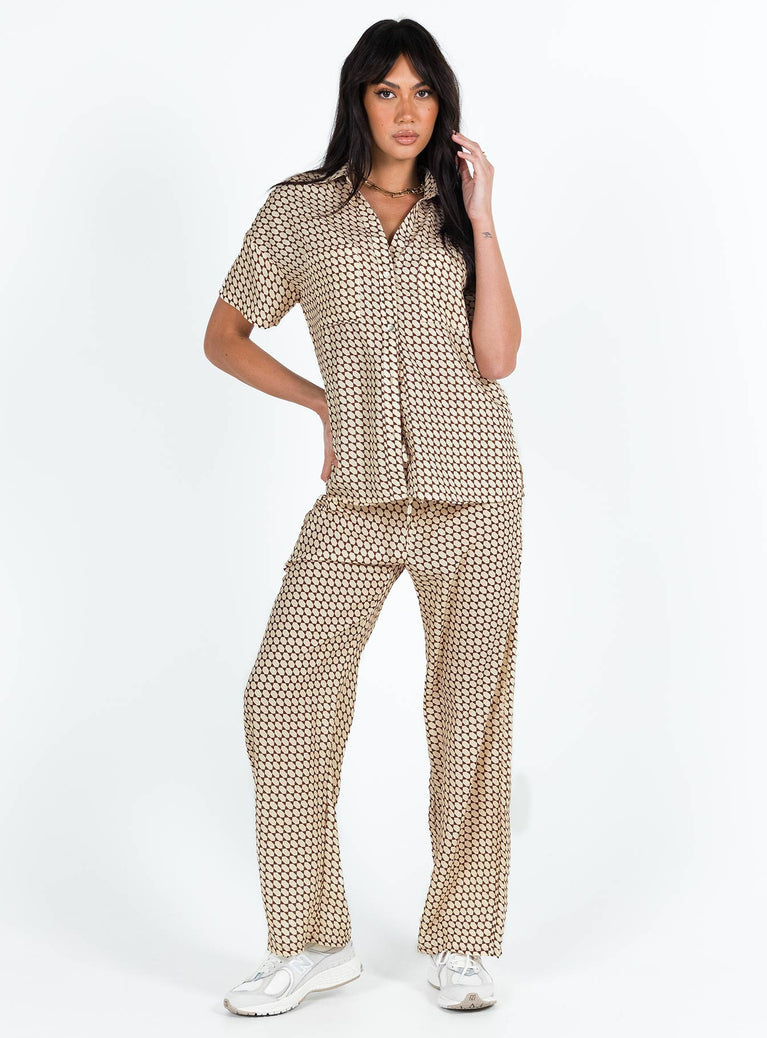 Matching set Geo print Short sleeve shirt Classic collar Button fastening at front Drop shoulder Twin front pockets Pants Elasticated waistband Twin hip pockets Wide leg 