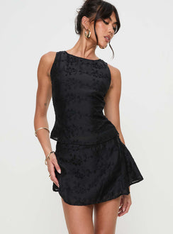 back view of model wearing Princess Polly Perilla Mini Skirt Black Mini Skirts 