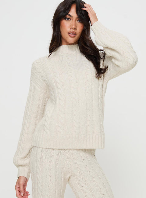 front view of model wearing Princess Polly Sharif Cable Knit Sweater Beige regular 