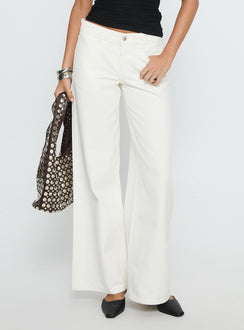 front view of model wearing Princess Polly Catiana Low Rise Wide Leg Jeans White Low Rise Jeans 