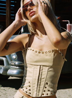 side view of model wearing Princess Polly Alinzia Eyelet Corset Top Beige Sleeveless Sweetheart 