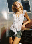 white frill top Lace material, v neckline, tie detail at bust, peplum hem&nbsp;