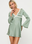 Silky long sleeve mini dress V neckline, lace trim, tie fastening at back, invisible zip fastening at side