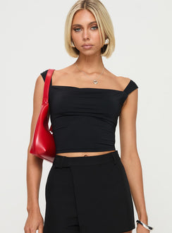 front view of model wearing Princess Polly Unwind Top Black Sleeveless Square Neck 