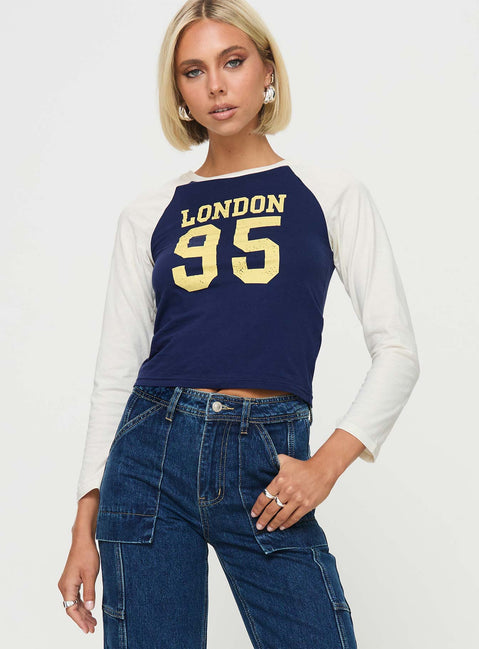 front view of model wearing Princess Polly London 95 Long Sleeve Top Navy Full Sleeves Crew Neck 