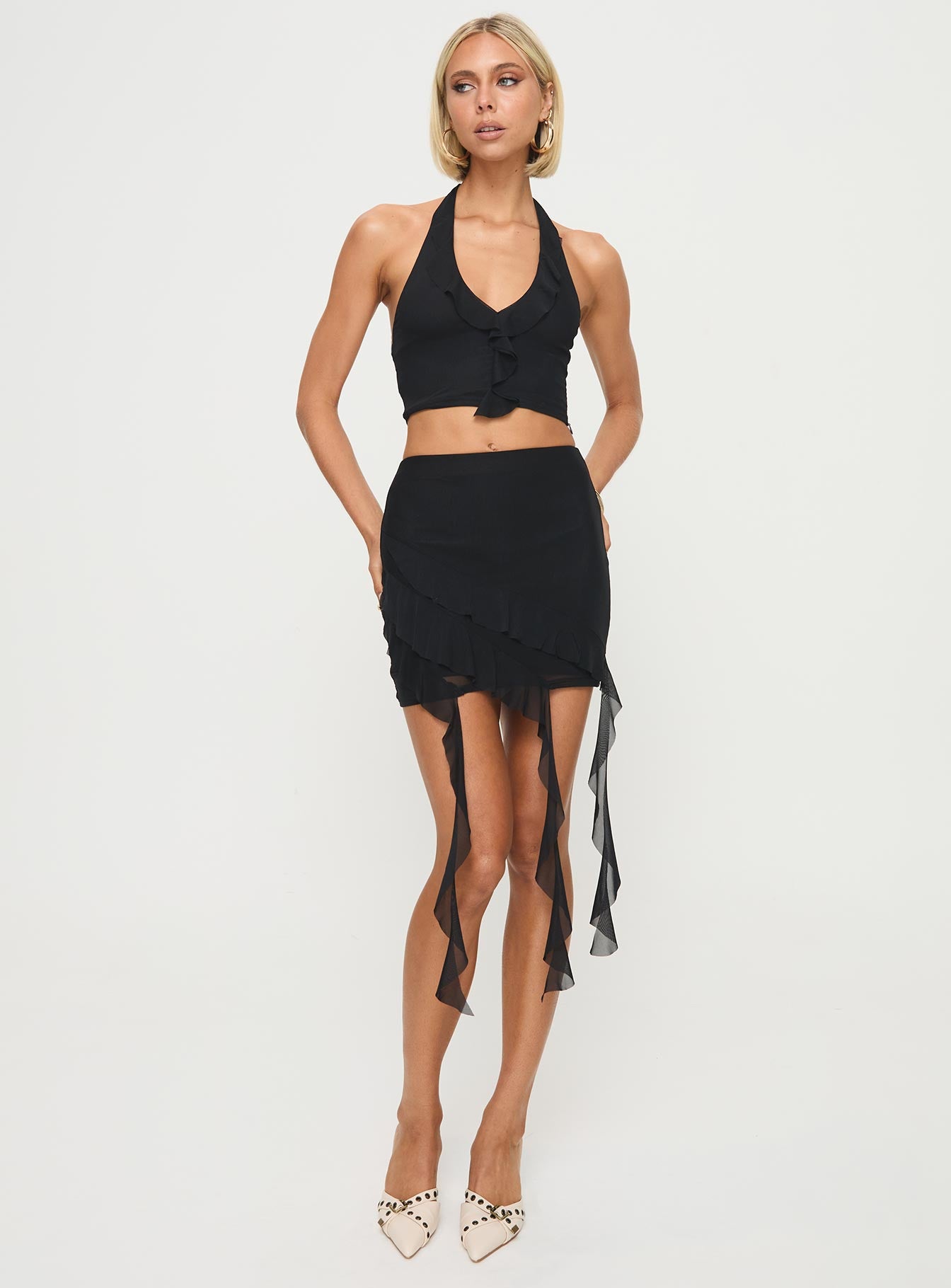 Black mesh matching set Mesh material, halter neck style, cropped fit, ruffle detail, invisible zip fastening