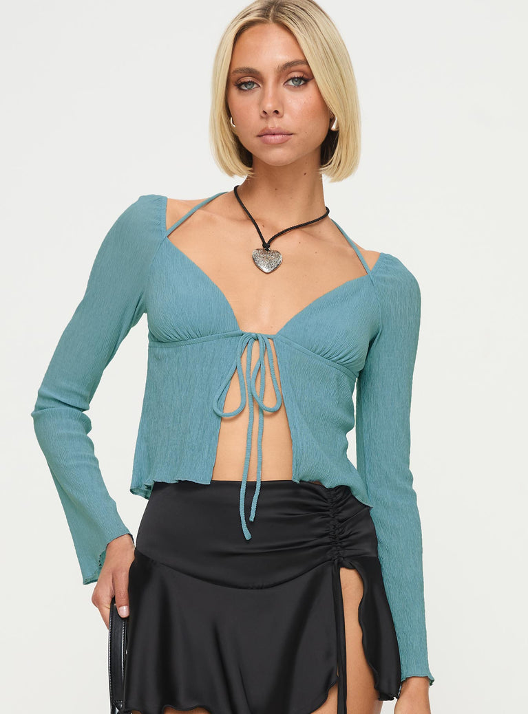 front view of model wearing Princess Polly Chantria Long Sleeve Halter Top Blue Full Sleeves Plunger 