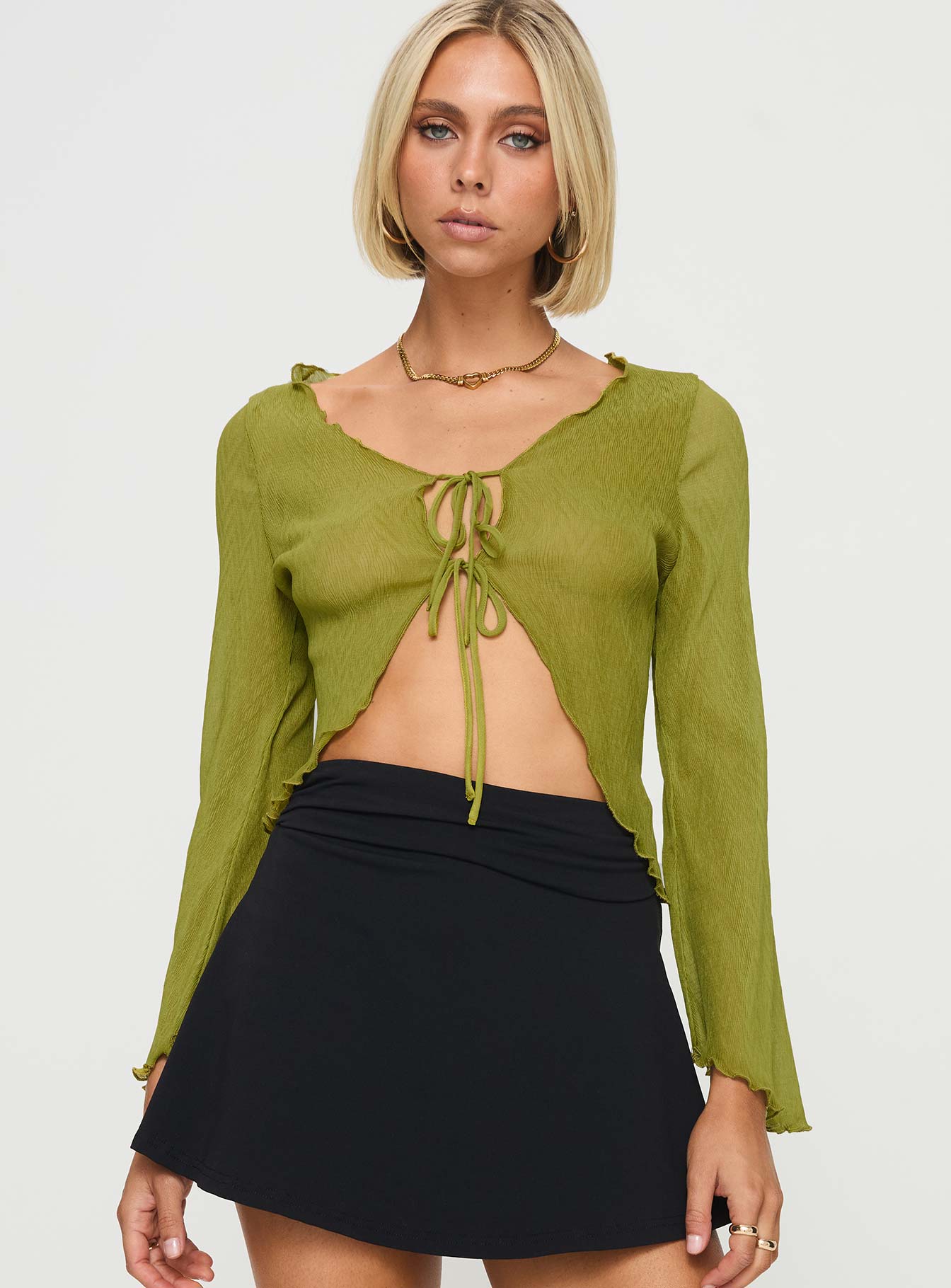 front view of model wearing Princess Polly Undone Long Sleeve Top Green Full Sleeves Scoop Neck 