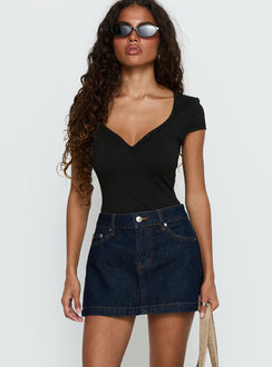   front view of model wearing Princess Polly Nicolina Low Rise Denim Mini Skirt Raw Denim Mini Skirts 