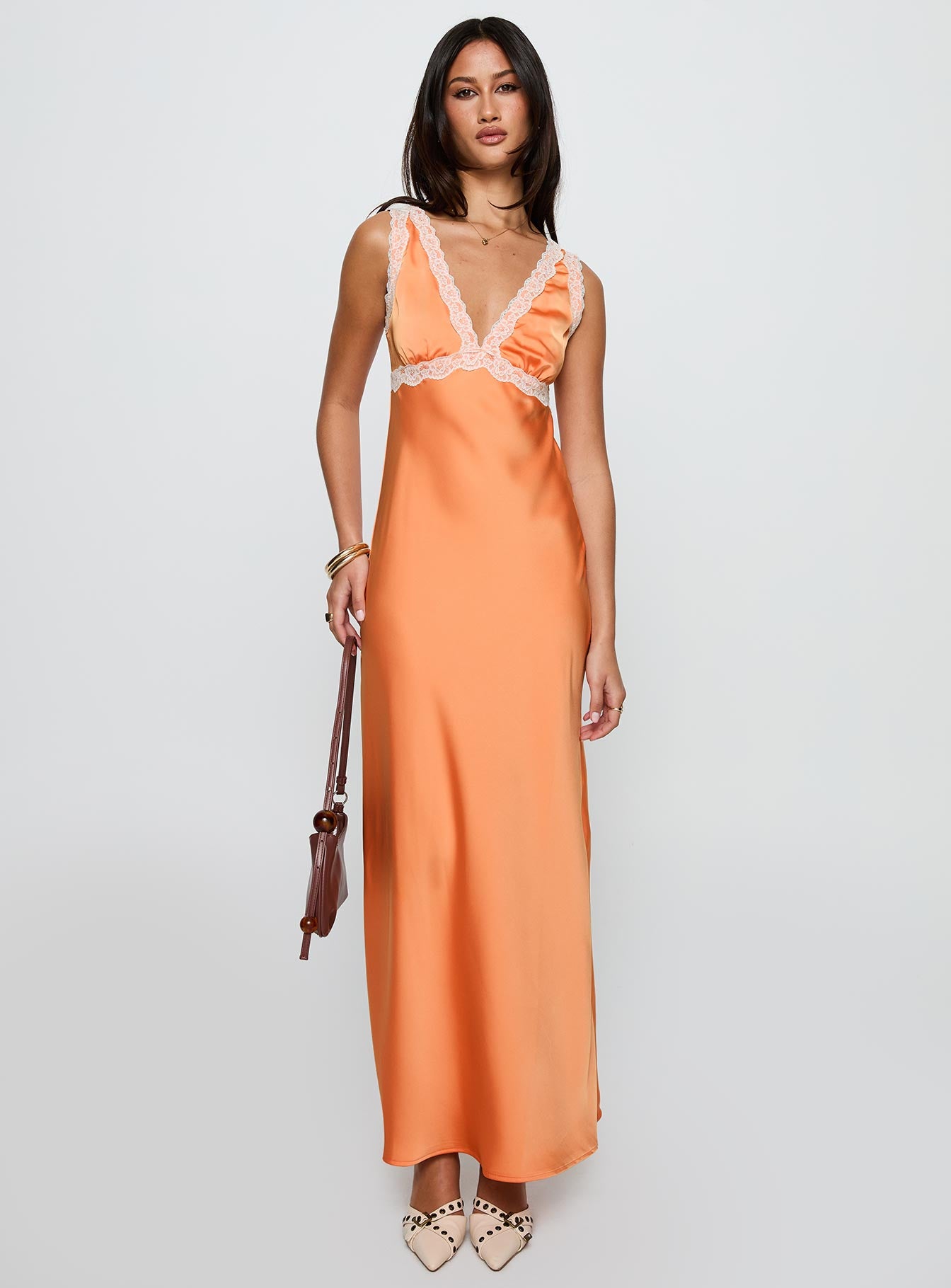 front view of model wearing Princess Polly Natassja Maxi Dress Orange V-Neck 