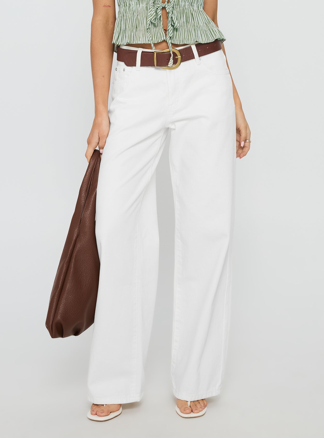 back view of model wearing Princess Polly Serenitia Mid Rise Straight Leg Relaxed Jeans White Wash High Waisted 