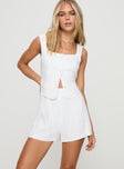 Two-piece linen set Vest top, fixed shoulder straps, square neckline, button fastening down front, faux front pockets High-rise shorts, invisible zip fastening at back Non-stretch material, fully lined