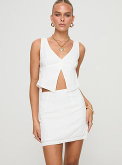 Two piece set Crop top, fixed shoulder straps, v-neckline, button fastening at bust, split hem High-rise mini skirt, invisible zip fastening at side Non-stretch material, fully lined