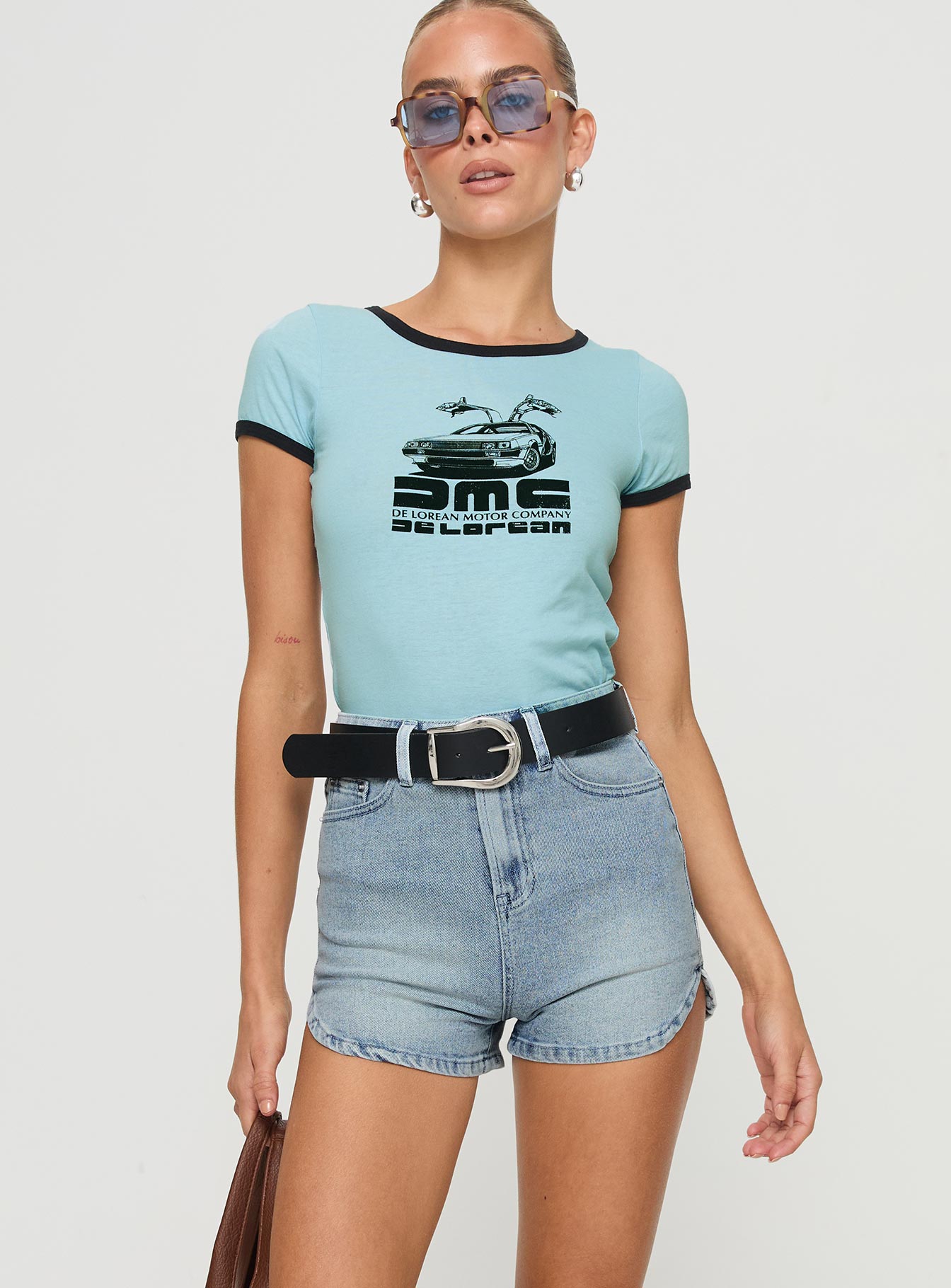 front view of model wearing Princess Polly Richardsons Denim Shorts Light Blue Wash High Waisted Shorts 