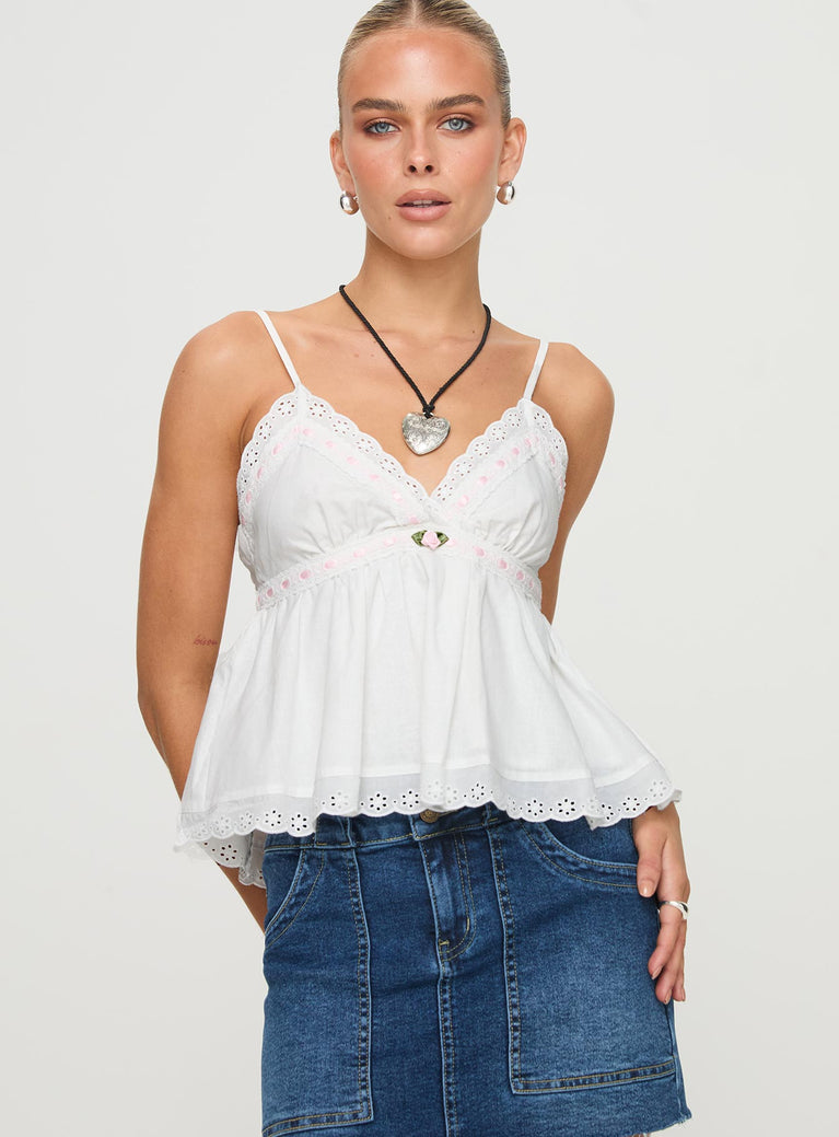 Linen top V neckline, adjustable straps, lace trim, floral detail Non-stretch material, lined bust