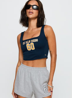 side view of model wearing Princess Polly UC San Diego Jersey Corset Top Blue Sleeveless Square Neck 