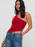 side view of model wearing Princess Polly Machiatto One Shoulder Top Red Sleeveless Asymmetric Neckline 