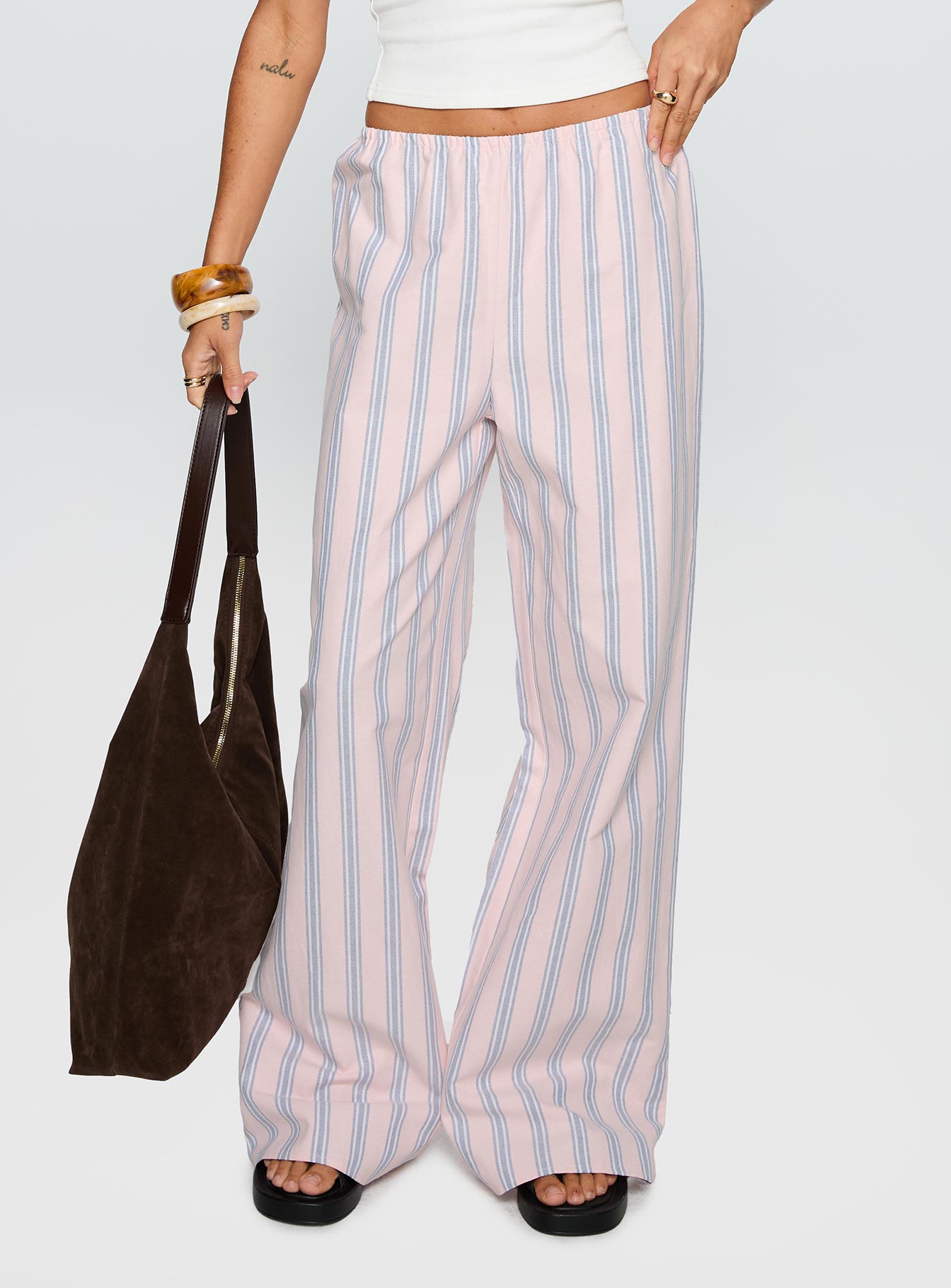 back view of model wearing Princess Polly Limestone Pants Pink Multi Low Rise Pants 