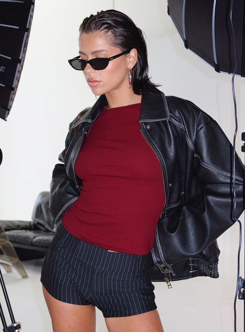 back view of model wearing Princess Polly Minette Micro Shorts Black Pinstripe Tall Low Rise Shorts 