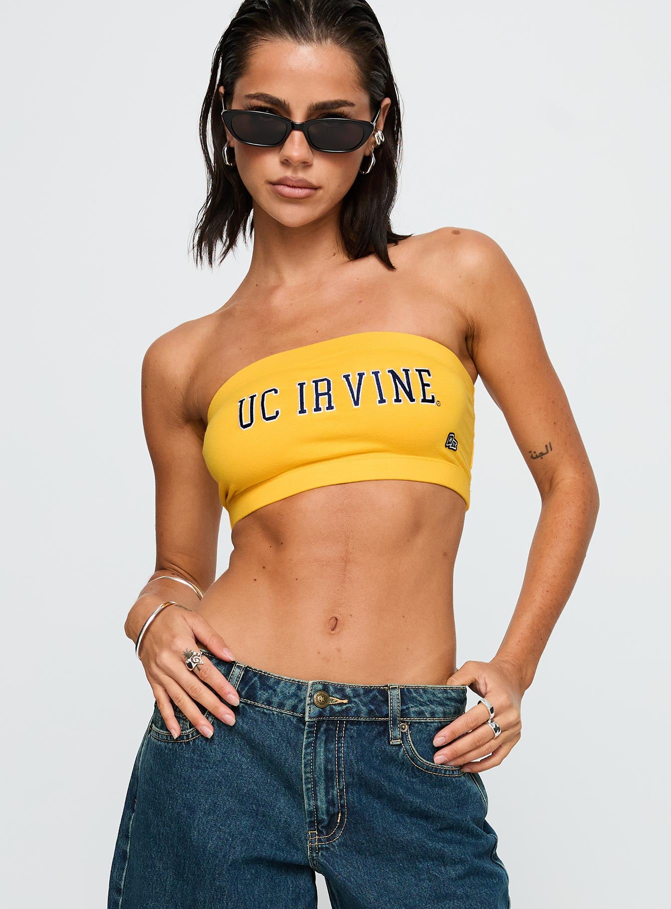 front view of model wearing Princess Polly UC Irvine Bandeau Top Gold Sleeveless straight 