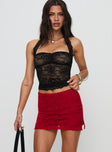 front view of model wearing Princess Polly Gigi Lace Skort Red High Waisted Shorts 