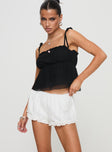 front view of model wearing Princess Polly Rhubarb Lace Shorts White Low Rise Shorts 