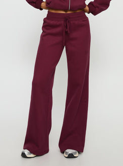 front view of model wearing Princess Polly Princess Polly Stargirl Wide Leg Sweat Pants Burgundy High Rise Pants 