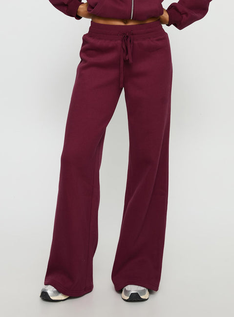 front view of model wearing Princess Polly Princess Polly Stargirl Wide Leg Sweat Pants Burgundy High Rise Pants 